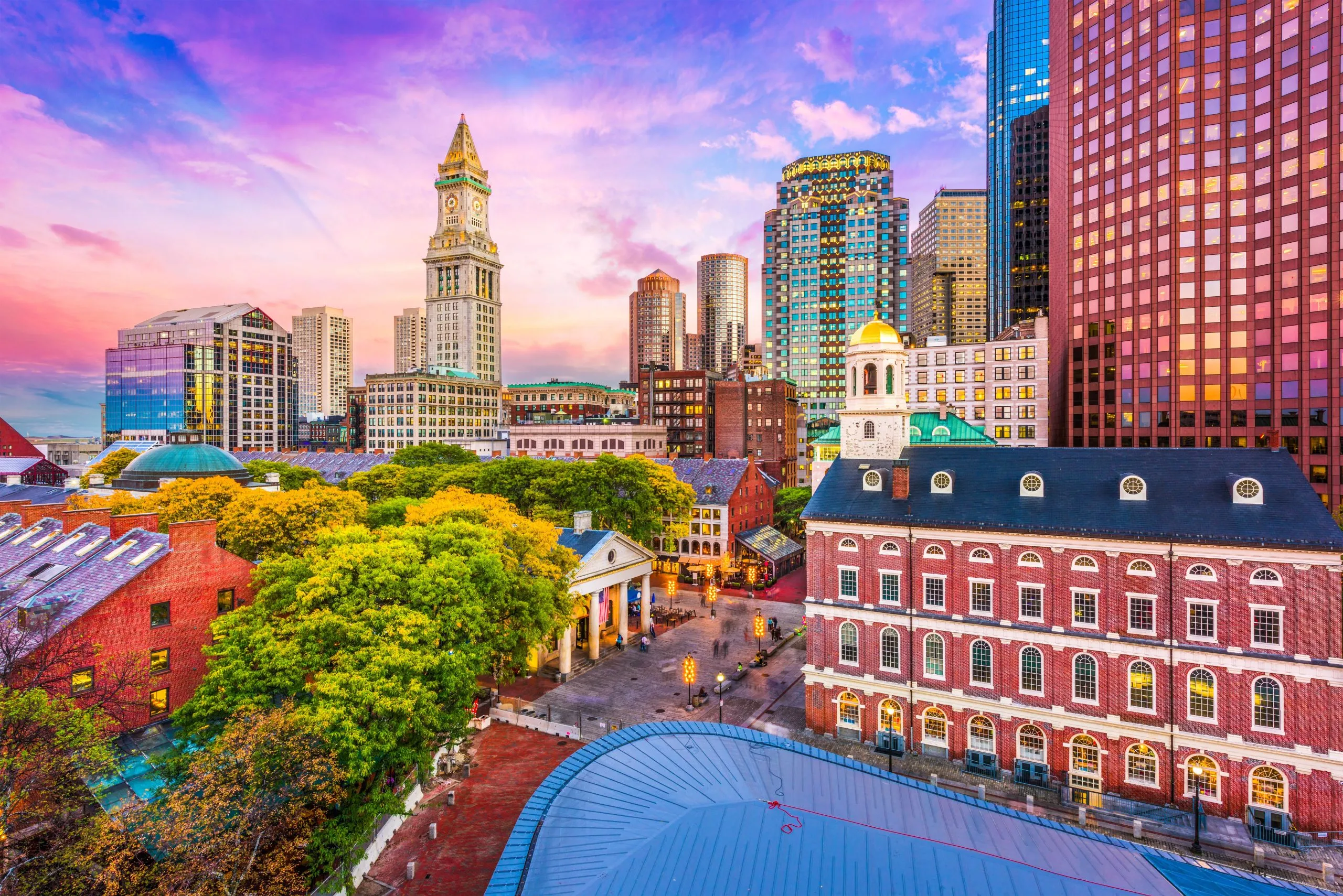 Boston skyline and Faneuil Hall at dusk